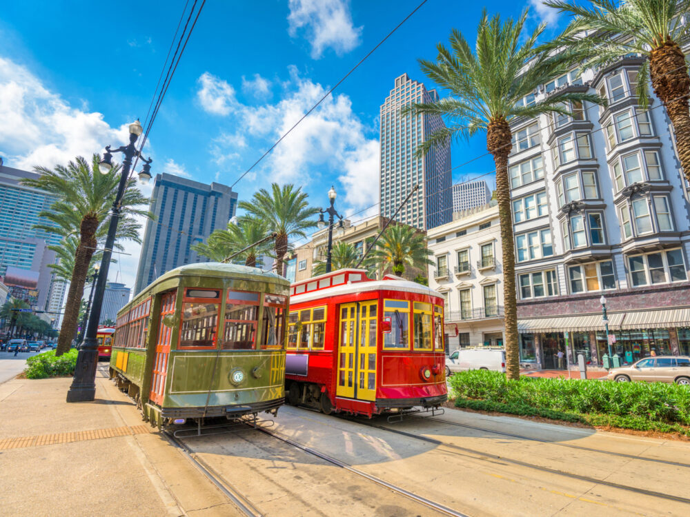 Streetcars in downtown New Orleans, one of the best places to stay when there
