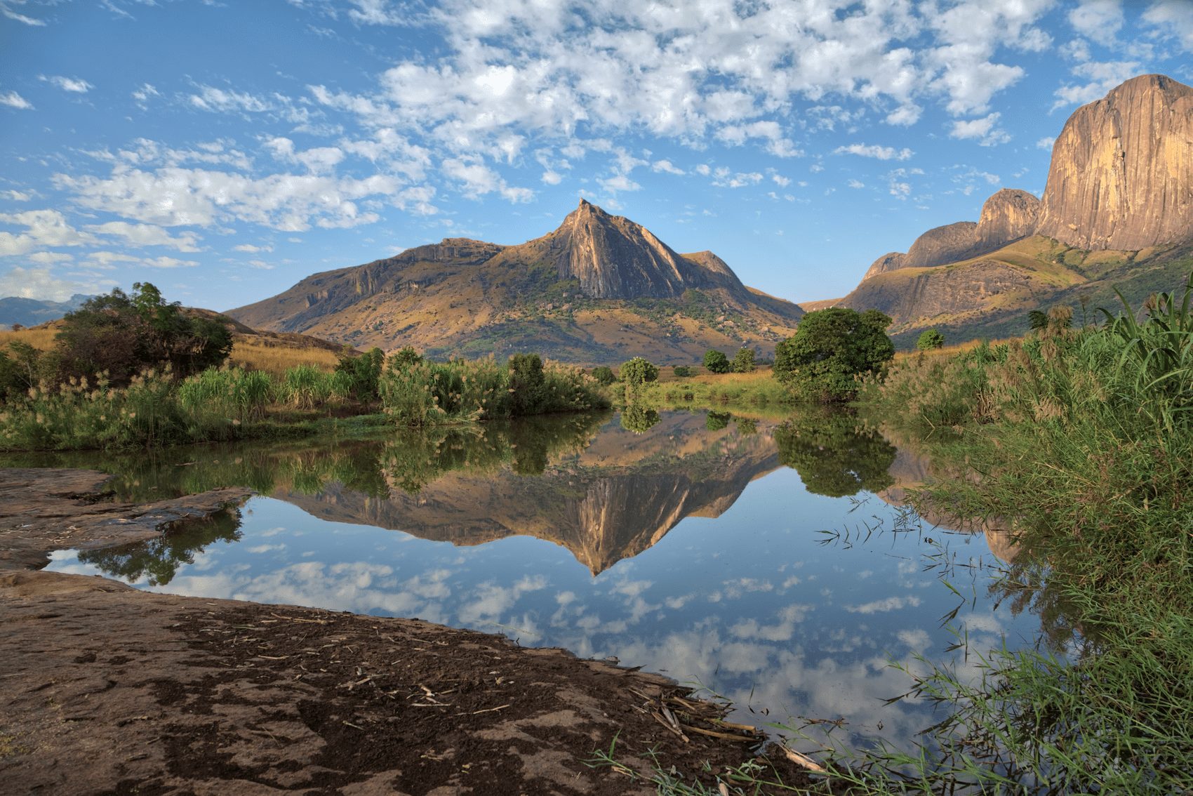 Andringitra National Park mountain range reflecting in a small water pond