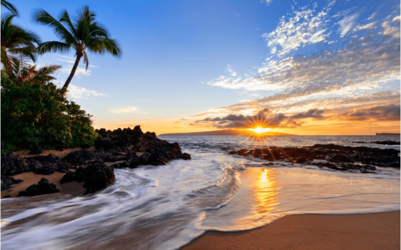 Sunset at Makena Secret Beach in Wailea, Maui, HI with sunstar