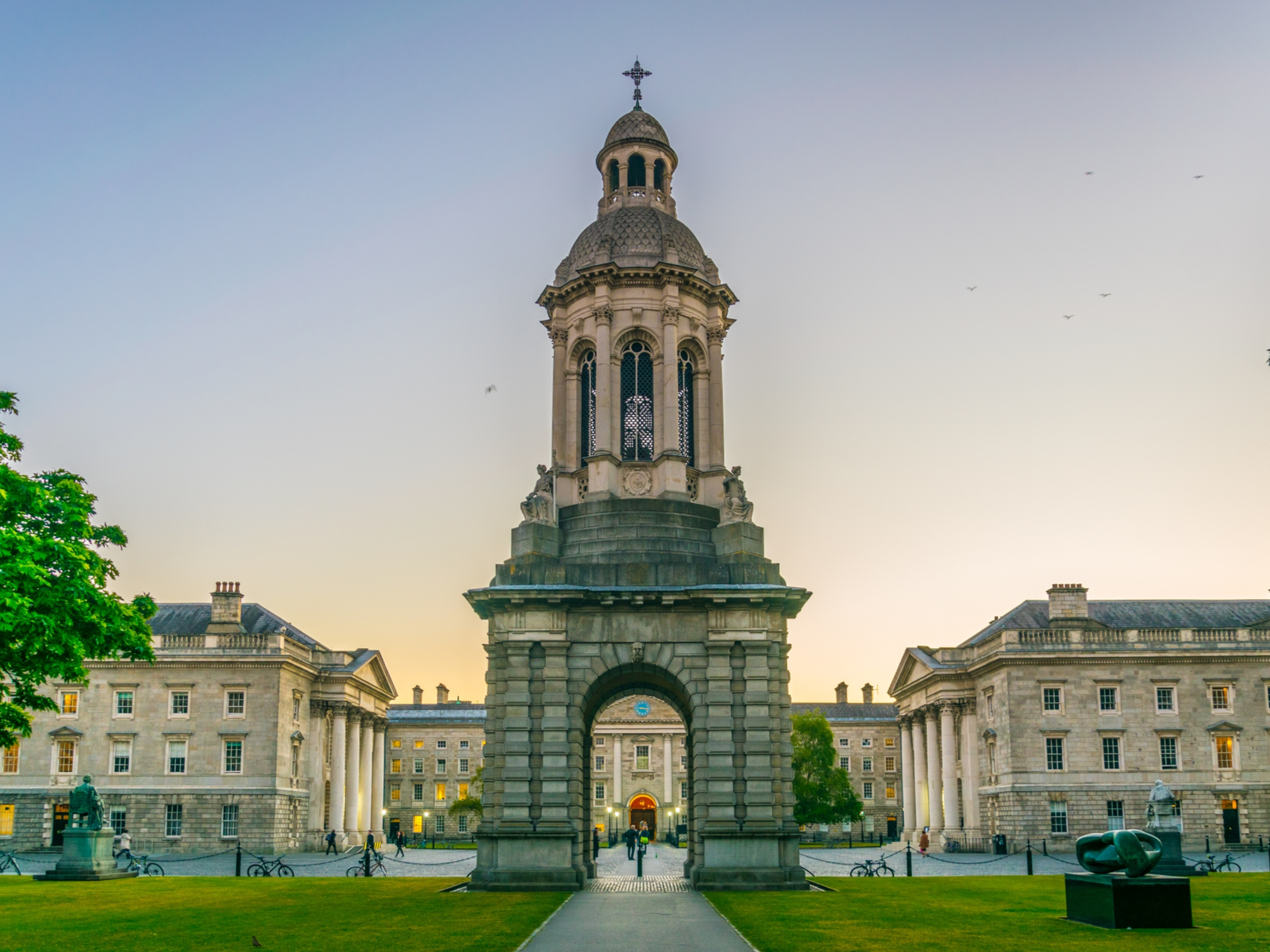 Beautiful portrait of the Campanile inside of the Trinity College Campus in Dublin, one of the best places to visit in Ireland