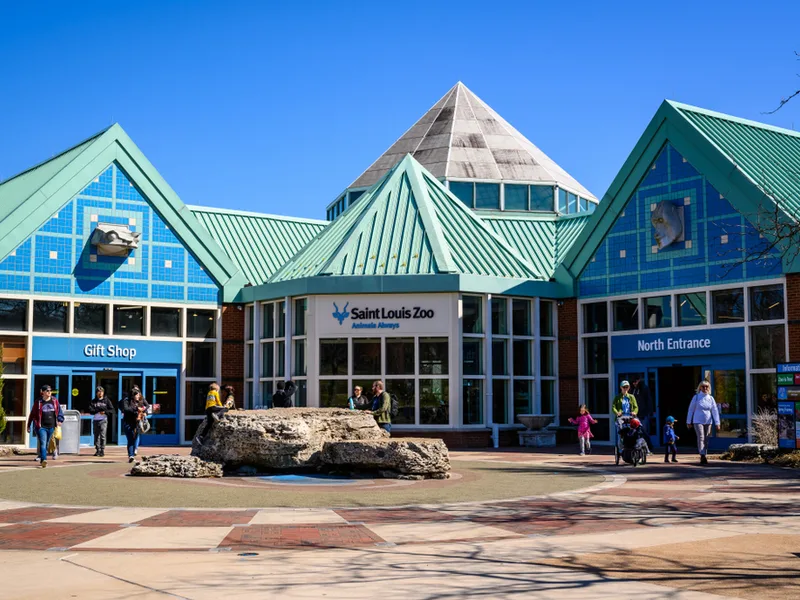 Photo of the entrance to the Saint Louis Zoo with entrances to the gift shop and North side of the park
