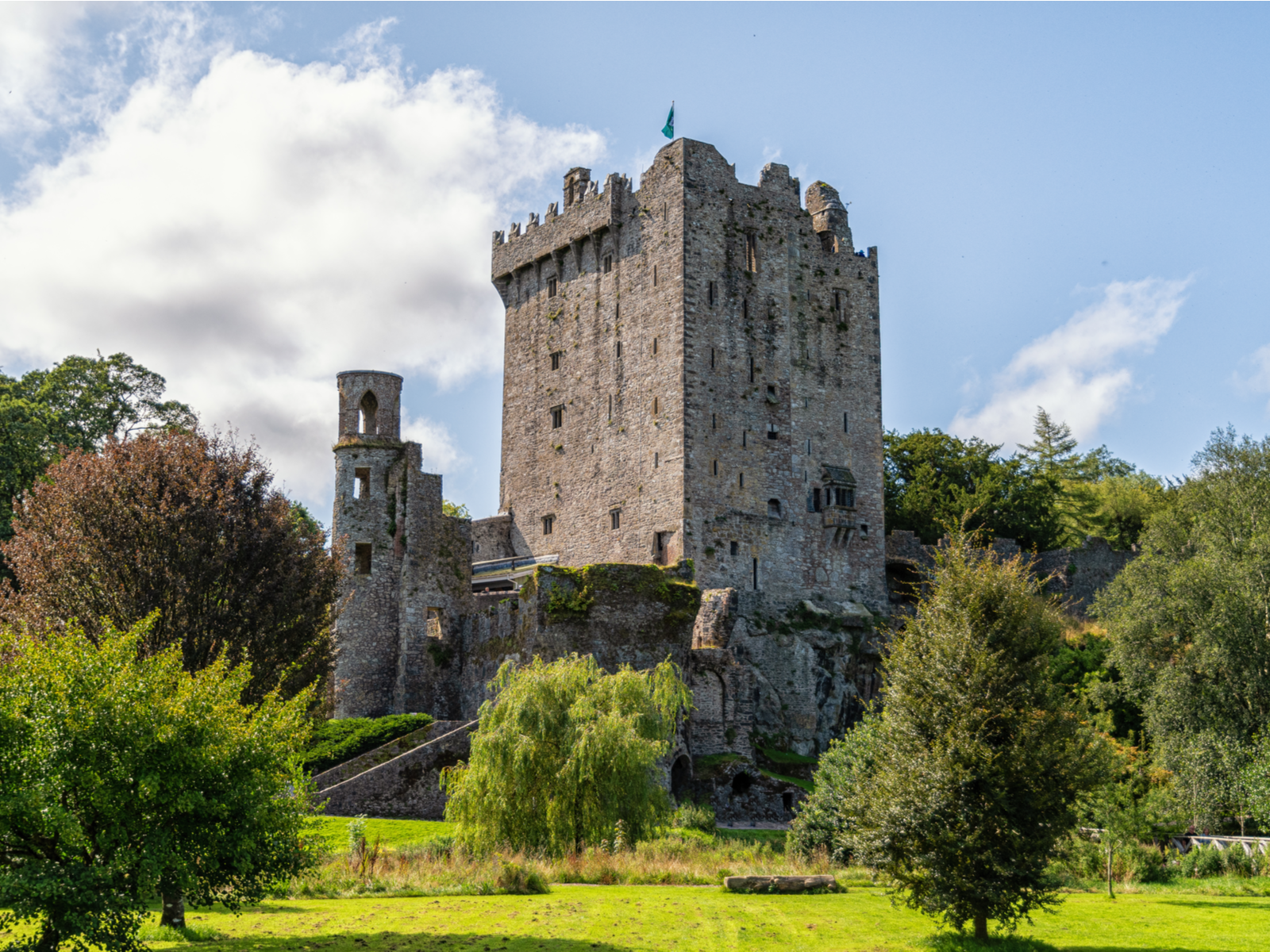 Ruins of a fortified tower at Blarney Castle, now one of the best places to visit in Ireland