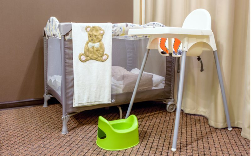 Image showing one of the best portable cribs set up in a hotel room