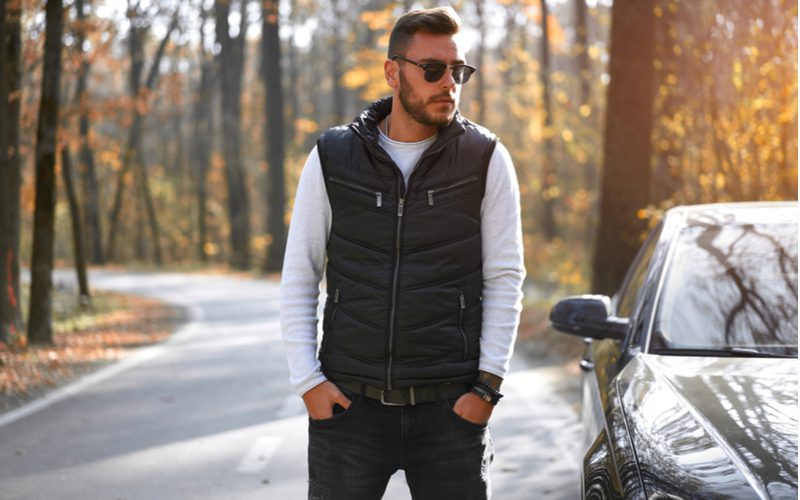 Guy wearing the best travel vest over a white shirt