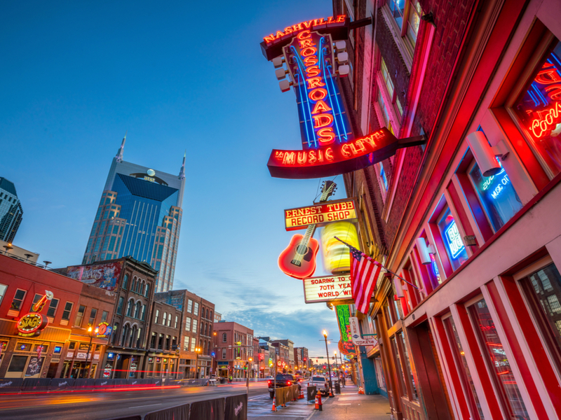 Image of neon signs in Downtown Nashville, one of the best places to stay when visiting