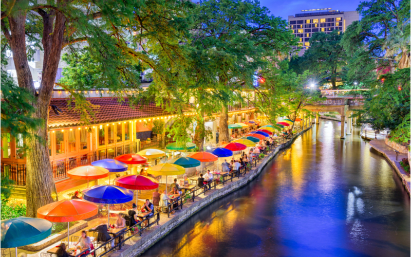 Featured image for the best Airbnbs in Texas featuring a boardwalk next to a river in San Antonio