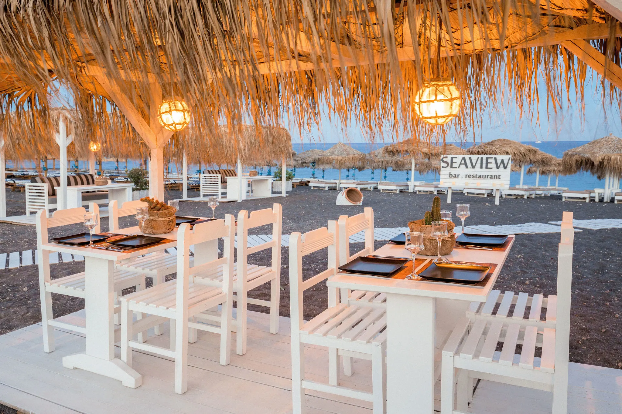 Seaview Santorini, one of the best restaurants in Santorini, pictured in the evening