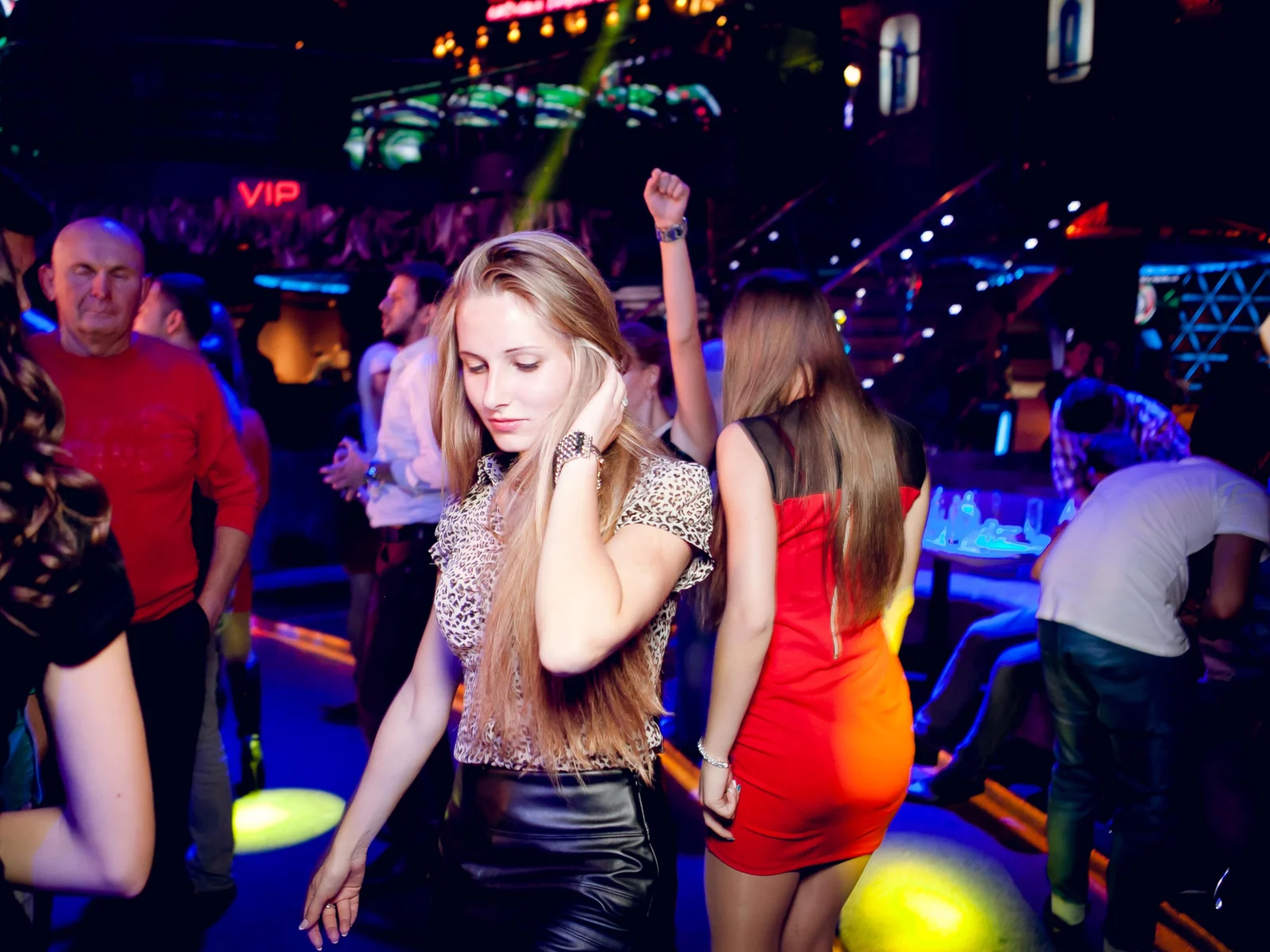 Hot Ukranian woman at a club, one of the best must-do things in Santorini