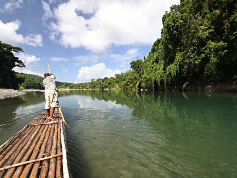 Image of one of the best places to visit in Jamaica, rafting down the Rio Grande river