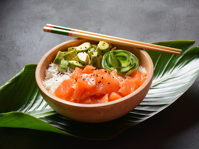 Poke salmon for a piece on the best restaurants in Hawaii