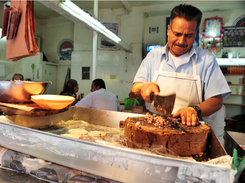 Man preparing food at Food at the best restaurants in San Juan, Puerto Rico