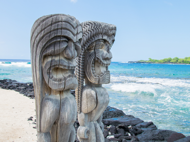Polynesian statues on the Big Island for a piece on the best luaus in Hawaii