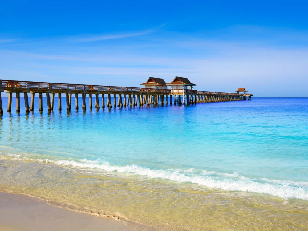 Naples pier pictured during March through May, the best time to visit Florida