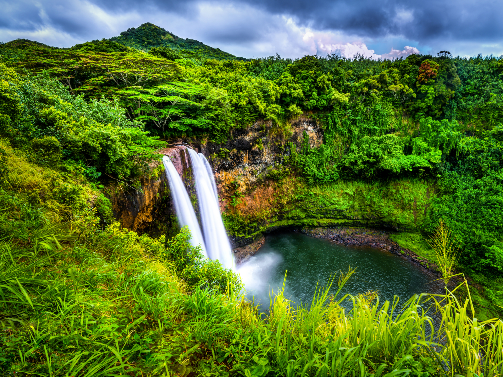 Wailua Falls during the best time to visit Kauai, in the early summer