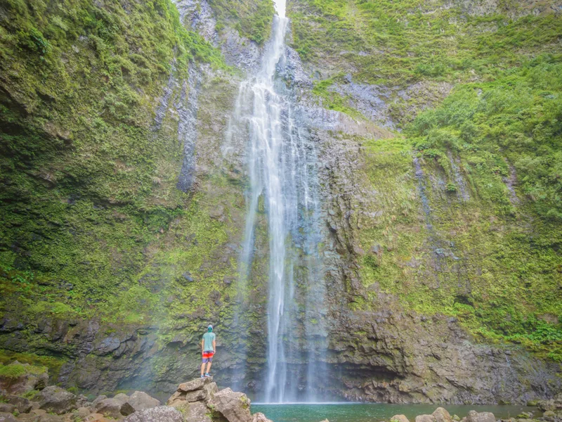 Man enjoying the Hanakapi’ai Falls Trail, one of Kauai's best hikes