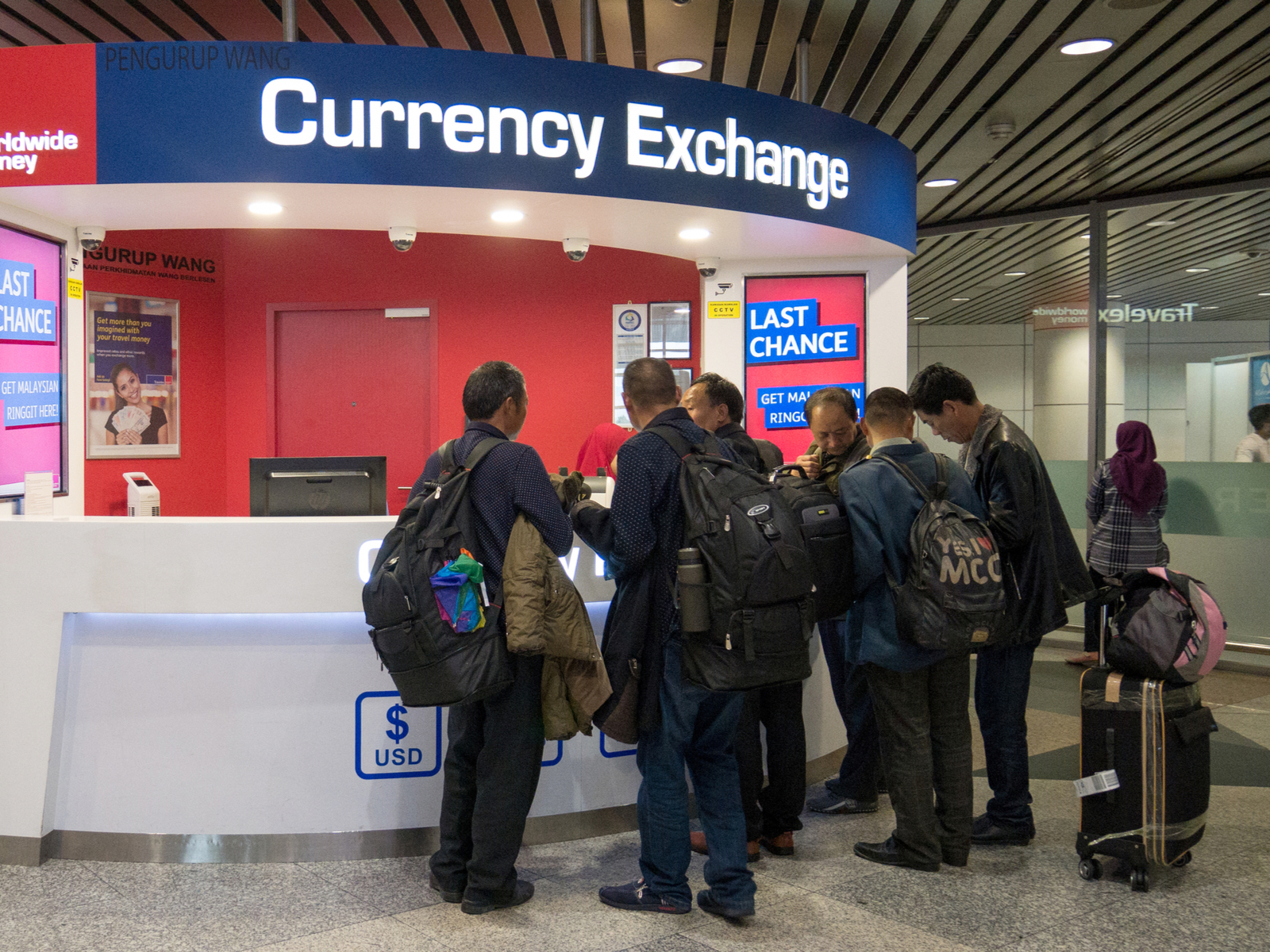 Currency exchange at the airport for a piece on Is Cancun Safe