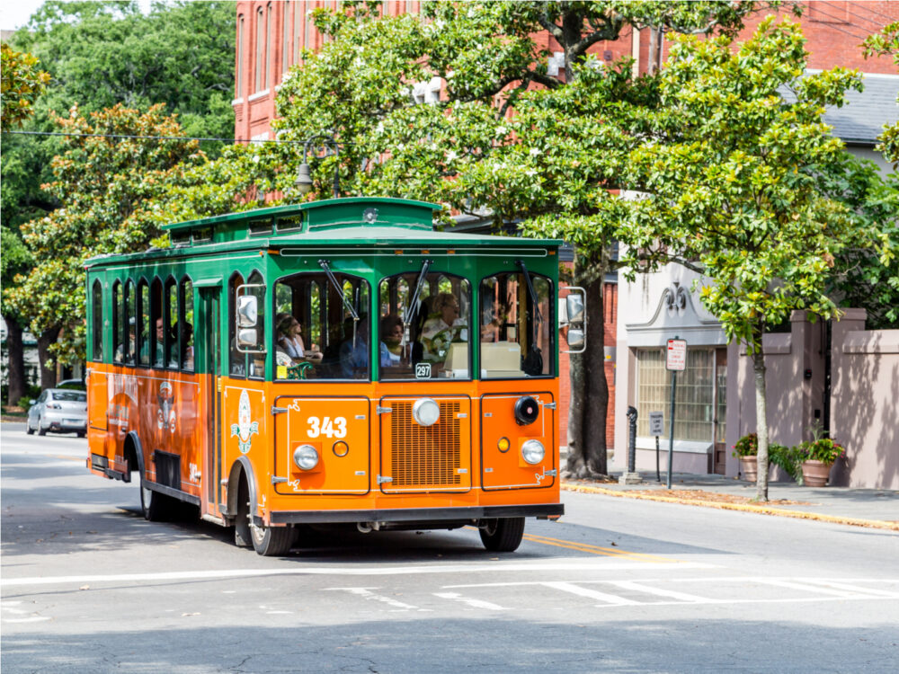 One of the best things to do in Savannah Georgia, the trolley tours, as viewed from the street