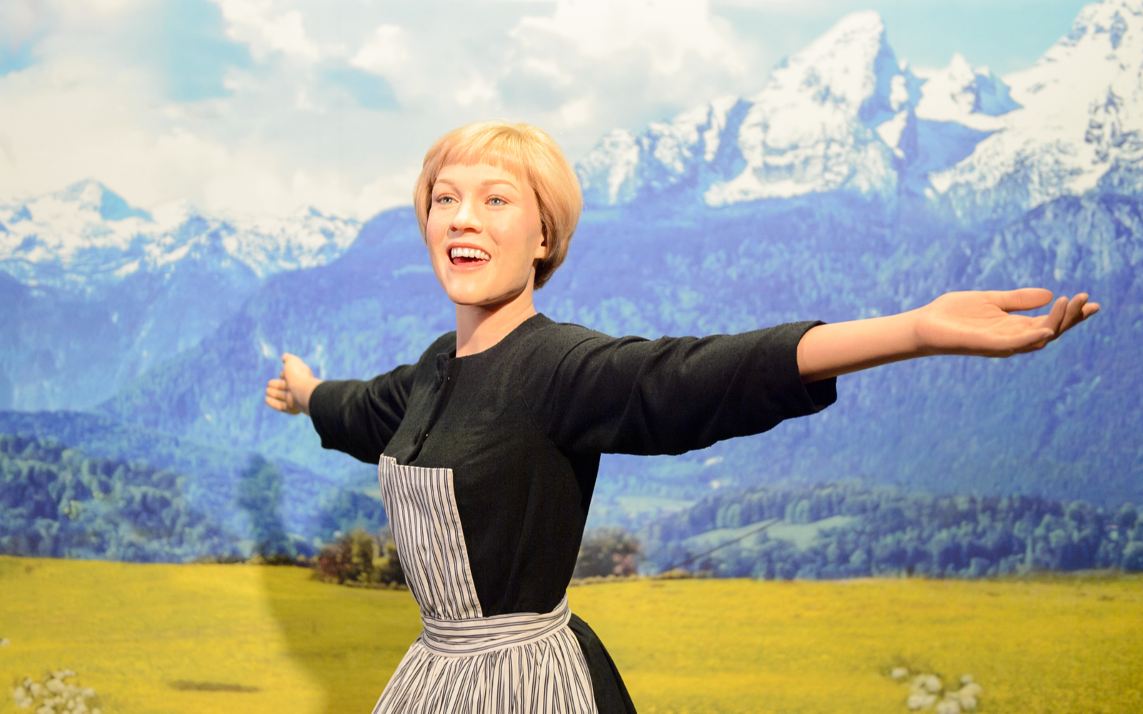 Featured image for The Sound of Music filming locations with Maria holding her arms out