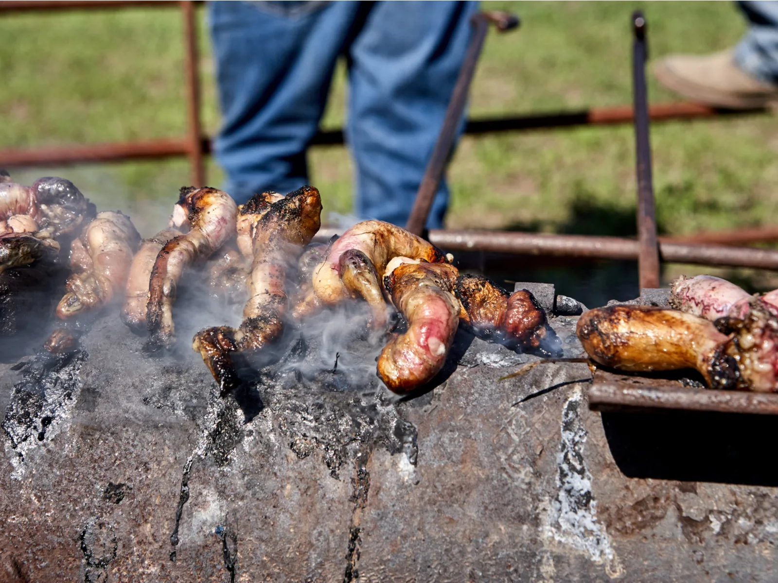 Food cooking on a grill for a roundup of the best things to do in Colorado Springs