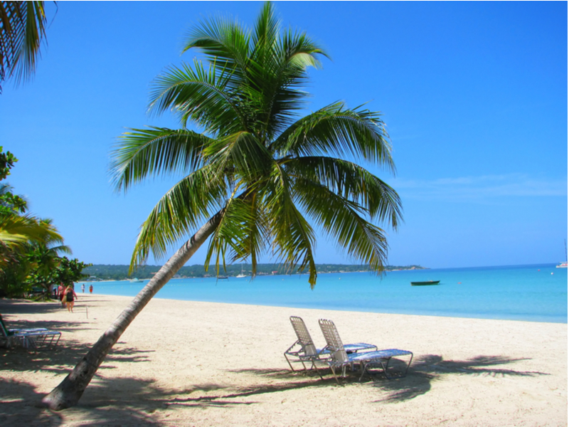 One of the best places to visit in Jamaica, a tropical white sand beach in Negril