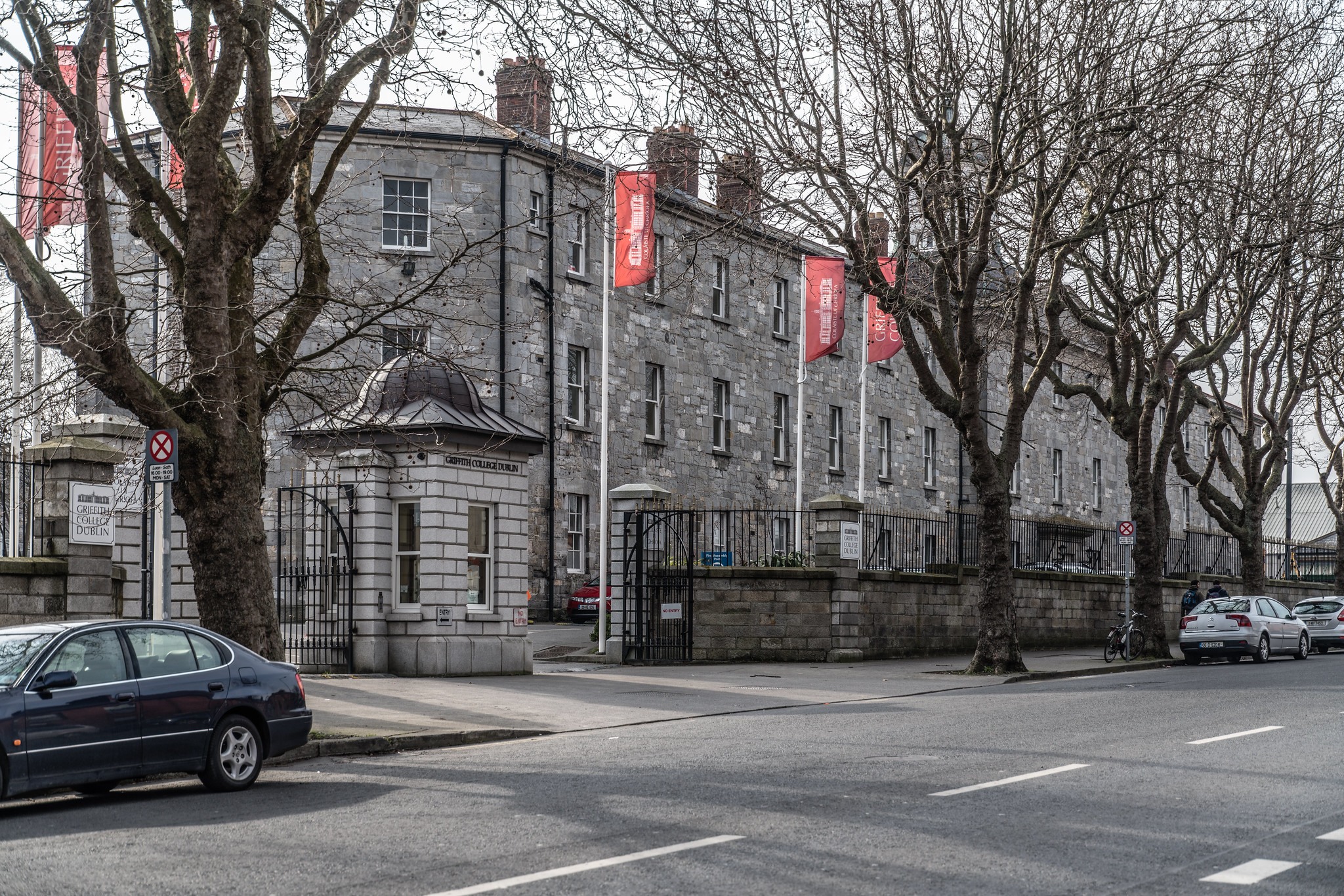 Cars parked in front of the old building at Griffith College, one of the best universities in Ireland, during the Fall