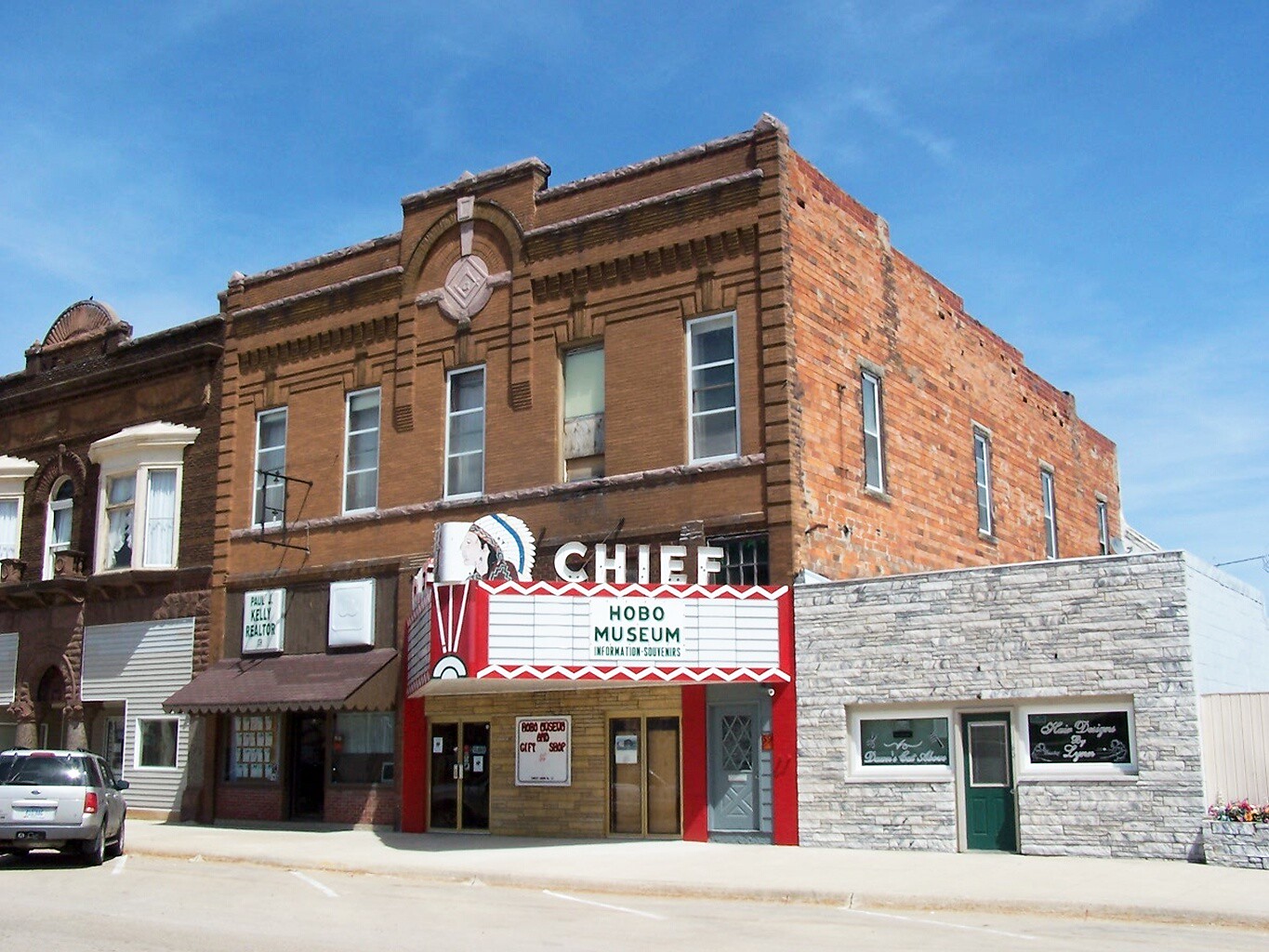 A piece on what to see in Iowa picture from the opposite street, The National Hobo Museum with its huge signage directly above the entrance