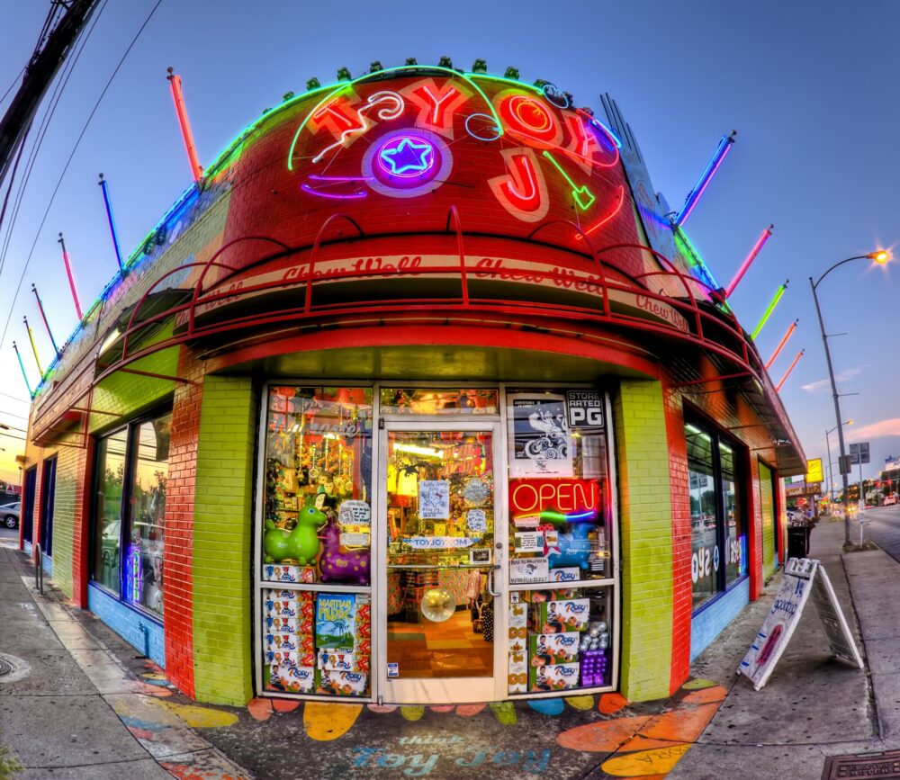 Fisheye view of the vibrant exterior and signage on one of the best toy stores in America, Toy Joy in Austin, Texas