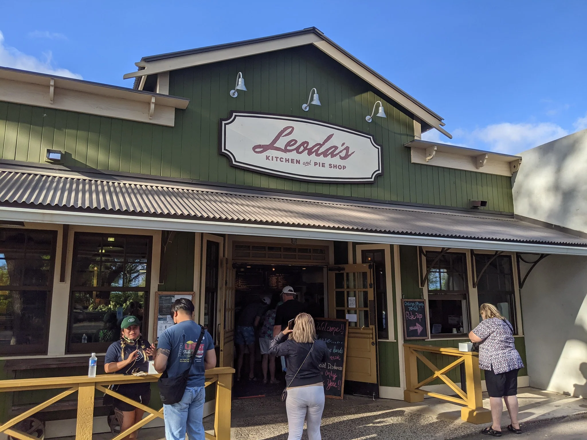 Tourist visiting the iconic Leoda’s Kitchen and Pie Shop, considered as one of the best restaurants in Maui, Hawaii, where some are lining up at the counter, and others waiting outside with their box of baked goods