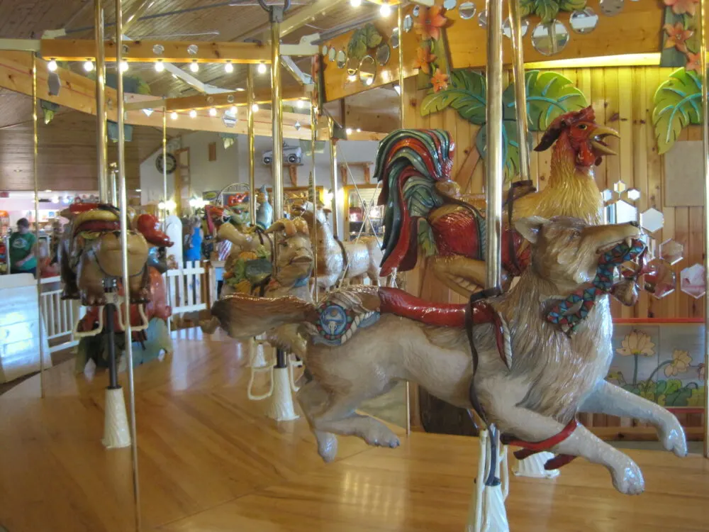 Carousel rides of various animals at LARK Toys in Kellogg, one of the best toy stores in America