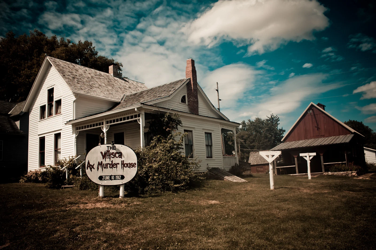 A spooky photo on Villisca Axe Murder House, a piece on what to see in Iowa, where an unsolved murder mystery took place