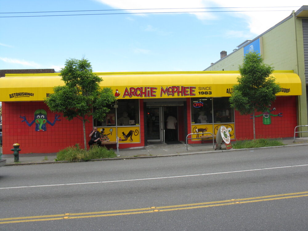Bright red and yellow colored Archie McPhee toy store in Seattle pictured from the opposite street as a piece on the best toy stores in America
