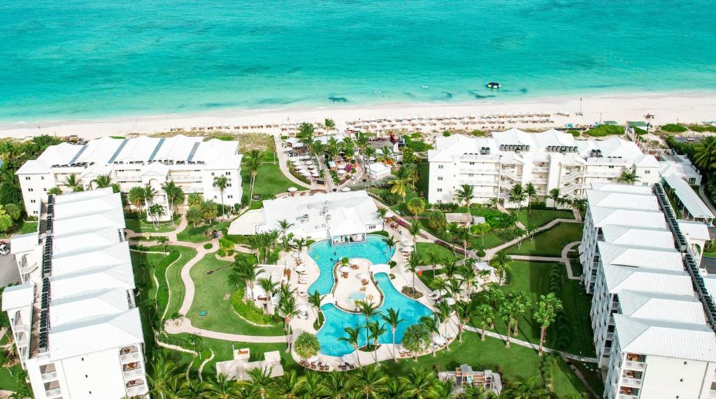 Aerial shot of the Alexandra and its gorgeous pool and beach for a top pick for the best resorts to stay at in Turks and Caicos