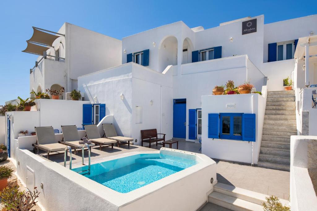 Afrodete Hotel, one of Santorini's best hotels, pictured on a sunny day in the pool