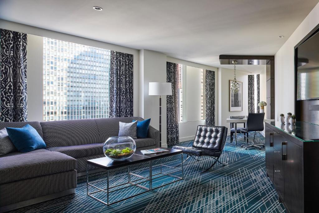 For a piece on the best hotels in Chicago, pictured is the living room in a room in the Sofitel Chicago Magnificent Mile