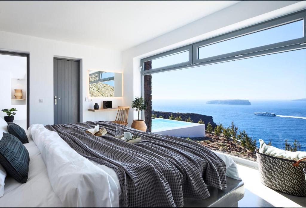 For a piece on the best hotels in Santorini, a room at the Coco-Mat Hotel with a room overlooking the ocean