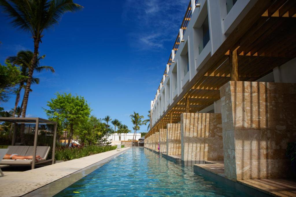 For a piece on the best resorts in the Dominican Republic, swim-up room pools at the Princess Family Club Bavaro