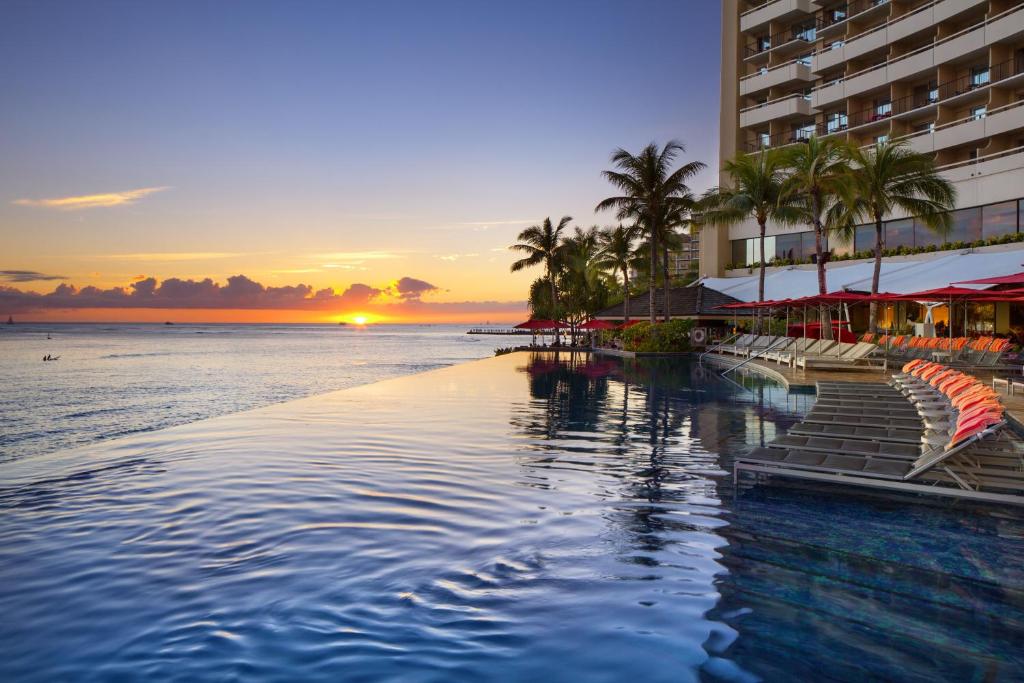 Infinity pool at the Sheraton Waikiki, one of the best resorts in Hawaii, at sunset