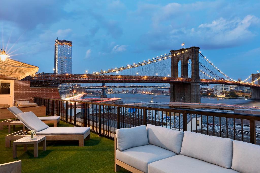 Rooftop lounge view of the C Seaport hotel, one of the best in New York City