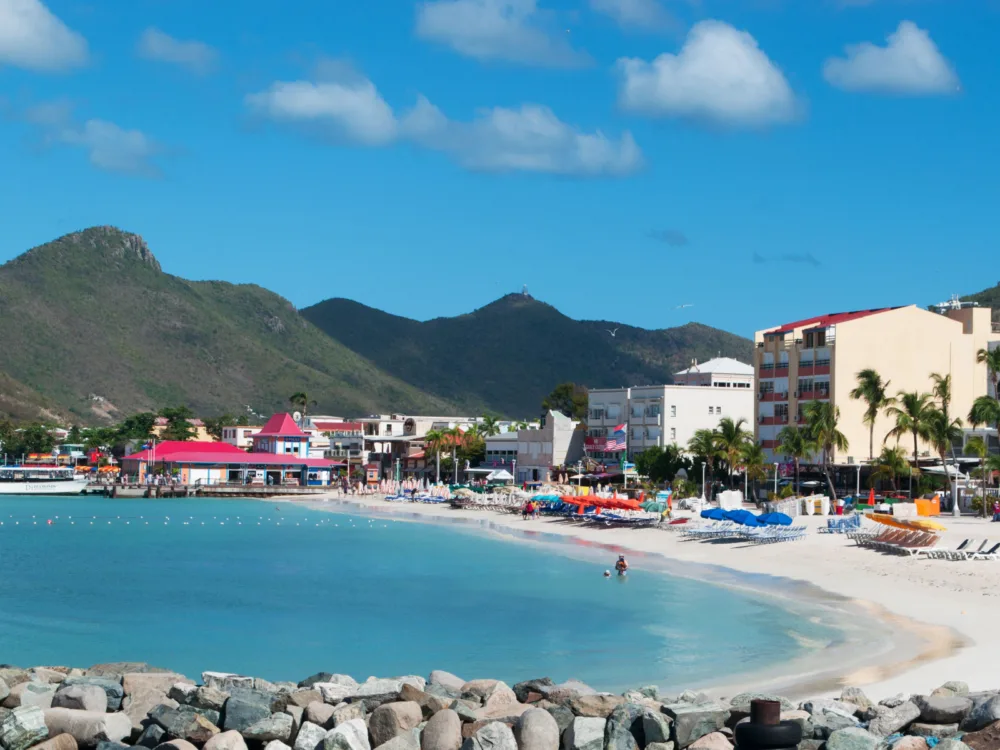 Image of Saint Martin, one of the safest islands in the Caribbean, pictured from the rocks looking at the bay