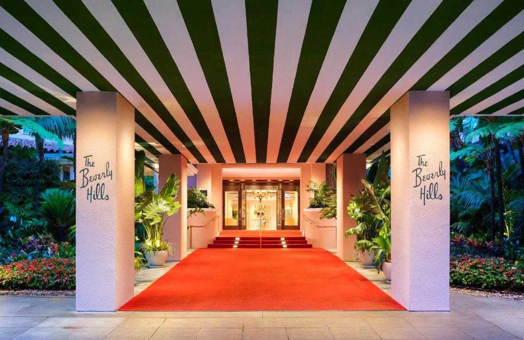 The Beverly Hills Hotel, one of the best hotels in Los Angeles, pictured from the entry point on the red carpet