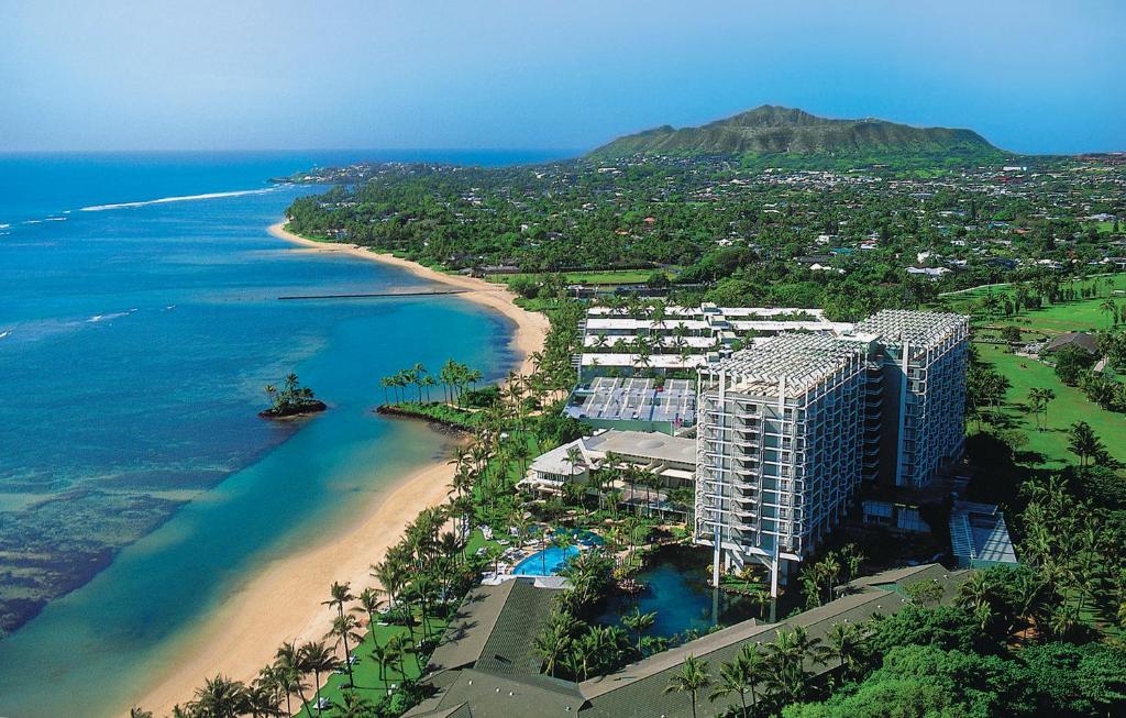 The Kahala aerial view featuring the pool and beach