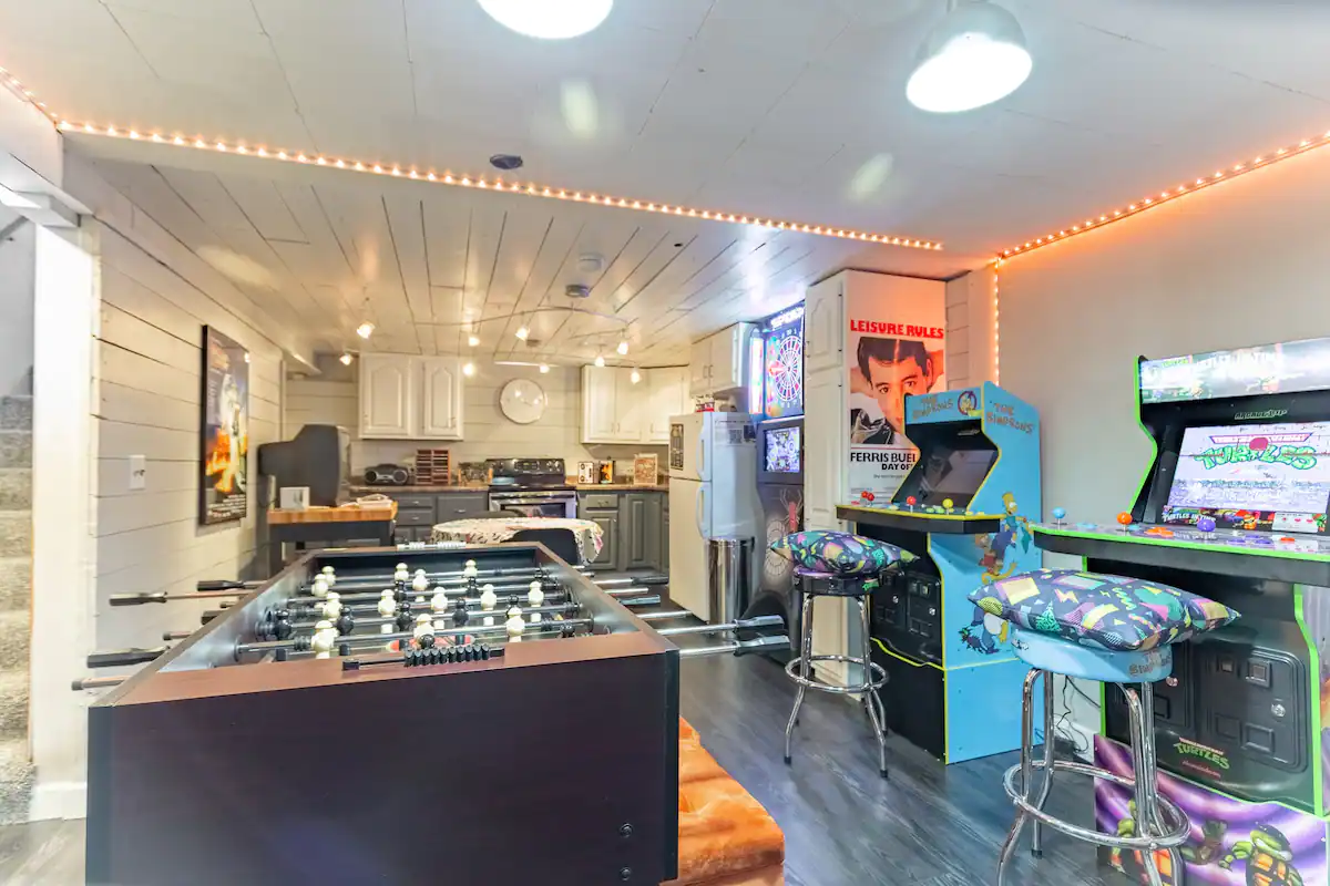 A game room with classic arcade games at Minneapolis 90’s Oasis, among the best bachelorette Airbnbs