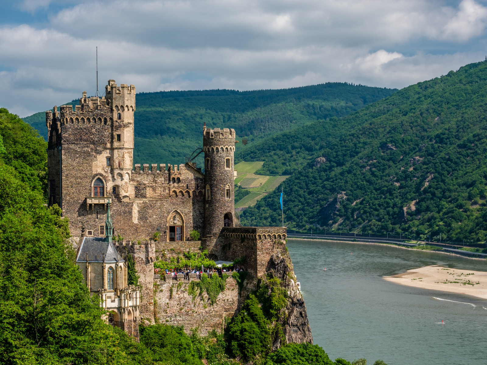 Tourist filed the grounds at Rheinstein Castle, one of the best castles in Germany, that sits on a boulder at Rhine Valley in Trechtingshausen