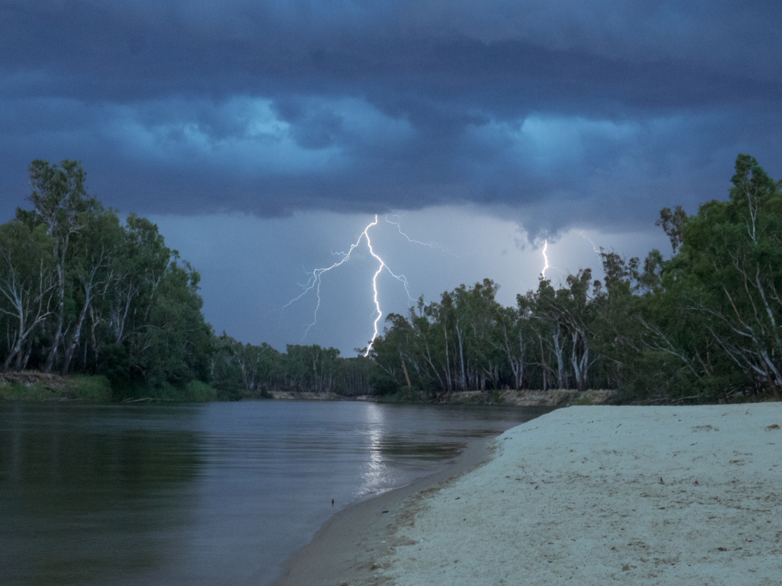 Storm on the Murray River during the worst time to visit Australia