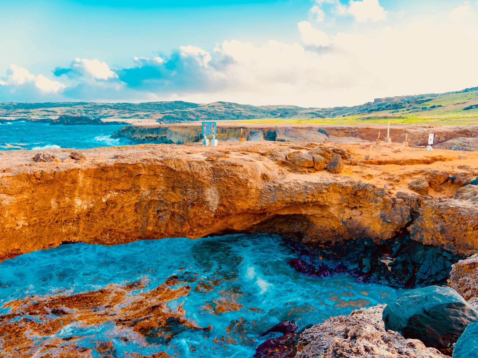 View of Conchi, one of the best things to do in Aruba, as seen from the edge of the cliff