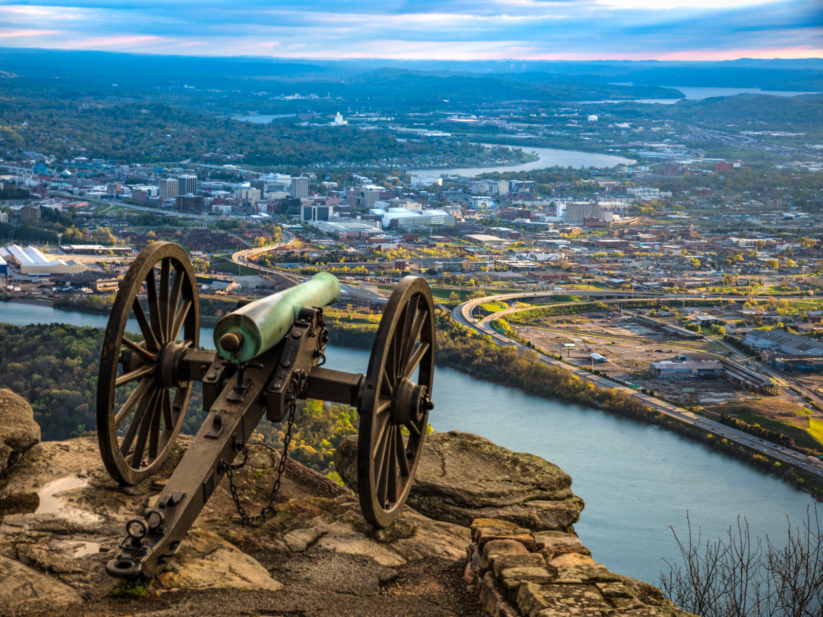 Pictured Point Park Civil War Cannon Monument on Lookout Mountain, with an aerial view of Chattanooga skyline, as a piece on one of the best things to do in Tennessee