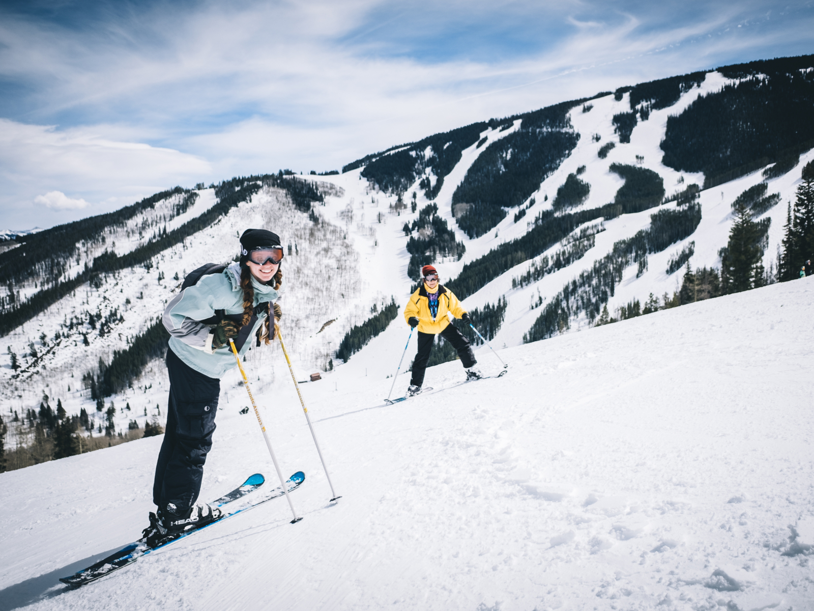 Two skiers going up the slopes at Beaver Creek Resort, one of the best ski resorts near Denver