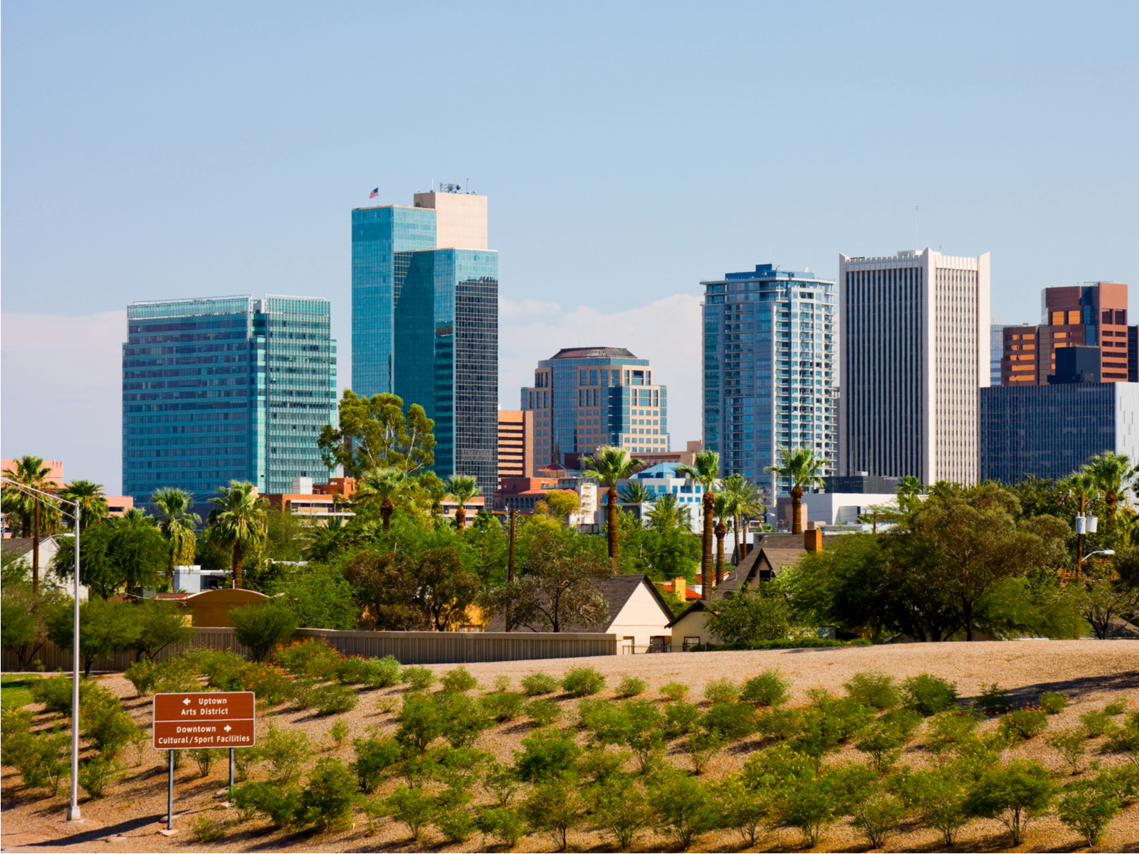 Skyline behind a walking path, one of the best things to do in Phoenix