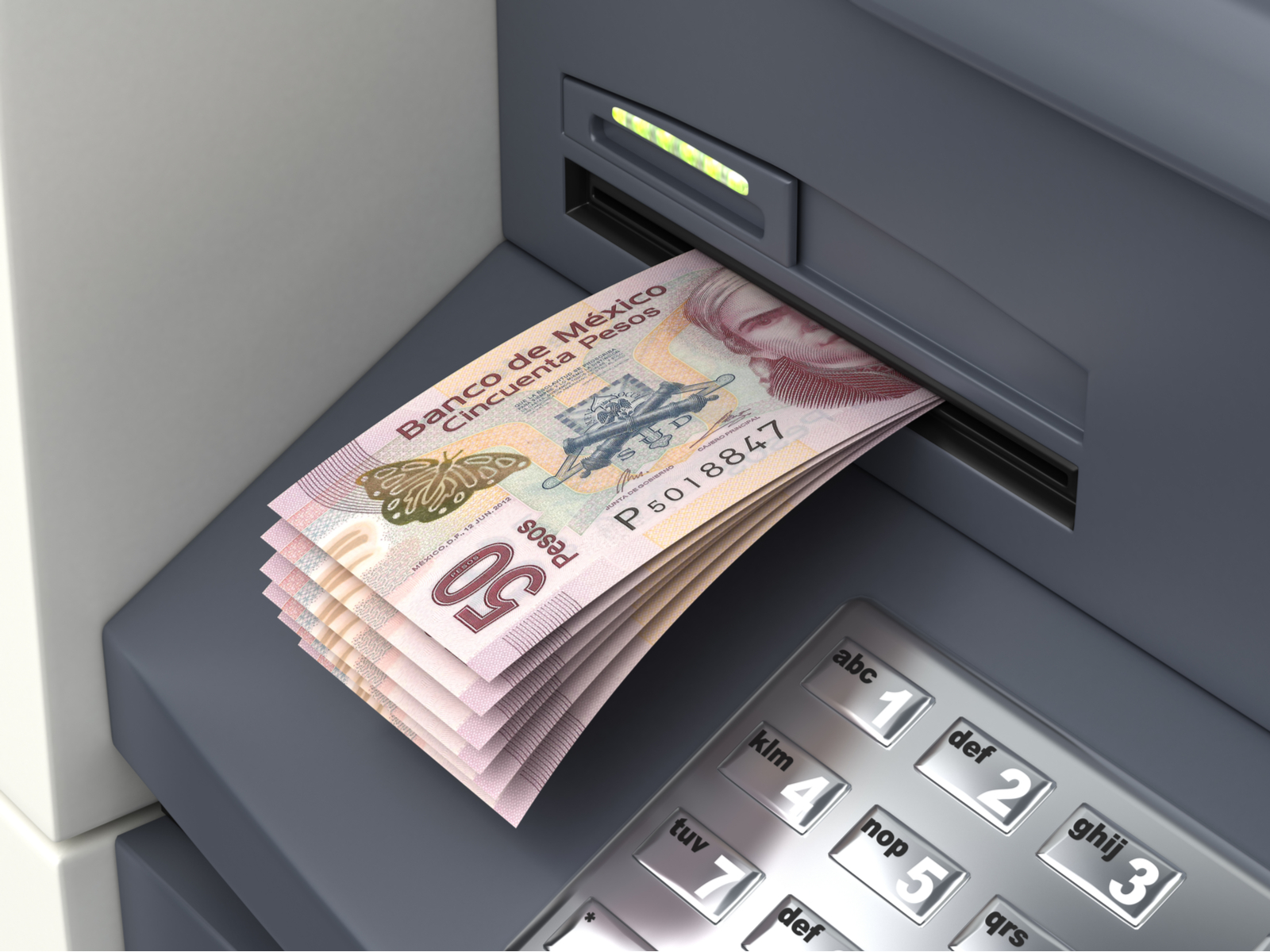 For a post on Is Mexico City Safe, a person withdrawing money from an ATM