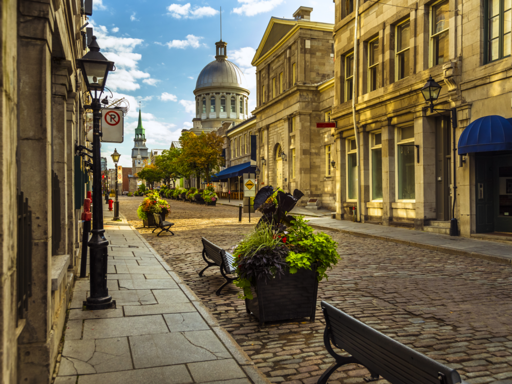 Taken from the streetside of Cobblestone Street showing historic building of Old Montreal, Quebec, a piece on the best places to visit in Canada